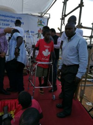 a-boy-receives-a-walking-aid-at-the-function