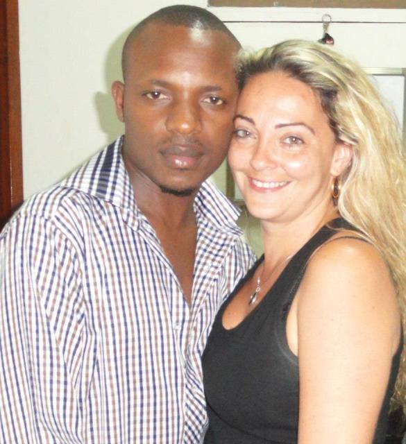 Abrah who is suspected to have spearheaded the sacking of DJ Peter with a white female friend