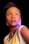 Anne Kansiime’s Busty Spilling Cleavage On Display