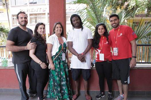 Bebe Cool poses with Crane Bank officials at the Eye camp