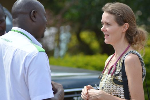 Dr. Kathy Burgoine, the Neonatal Lead at Mbale Regional Referral Hospital having a work with Mr. Muzamiru Kiirya Nkenga, the Branch Manager KCB, Mbale Branch