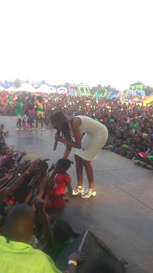 Sheebah Karungi entertaining a mammoth crowd of kids at Kololo Airstrip on Sunday during Green Kids Christmas Party