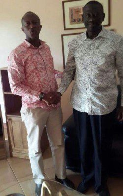 Frank Gashumba with Kizza Besigye