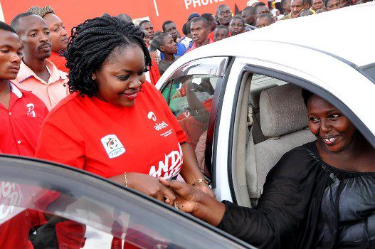 Airtel's Remmie Kisakye Head od Brand and Communications congragulates Mbarara's Grace Twongyeirwe on her win