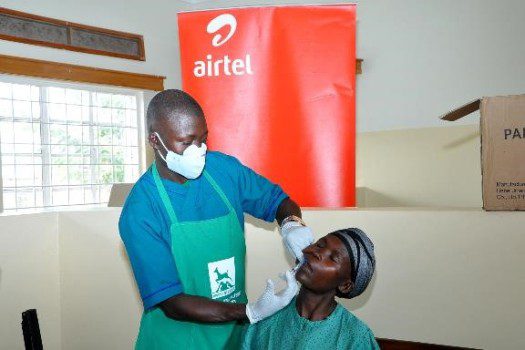 a-dentist-examines-a-ladys-teeth-at-the-airtel-health-camp-in-mbale-district