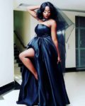 Maama Fiina showers blogger in dollars