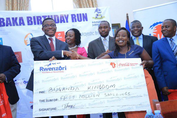Coca-Cola Uganda hands over 50 Million Sponsorship Package to the 5th Edition of the annual Kabaka Birthday Run through its brand Rwenzori Natural Mineral Water Coca-Cola Uganda hands over 50 Million Sponsorship Package to the 5th Edition of the annual Kabaka Birthday Run through its brand Rwenzori Natural Mineral Water
