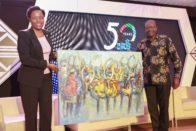 Rotarians sing and dance for to secure the future
