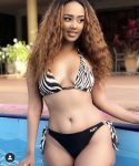 Photos: Jose Chameleone’s new manager Bijou Fortunate shows off stunning bikini body