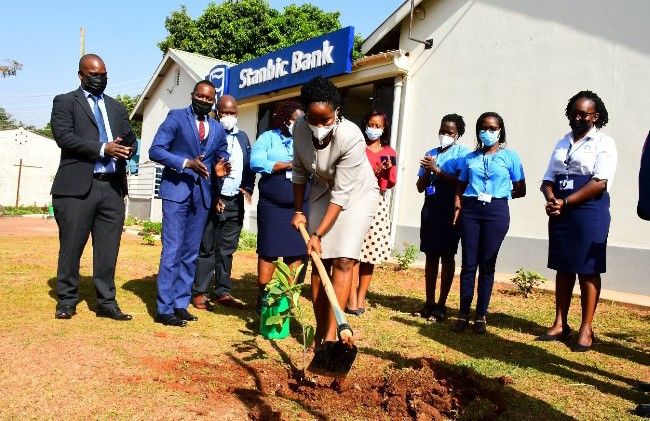 Photos: Stanbic Bank mourns Gov. Mutebile by planting 72 fruit trees in honour of his fruitful life