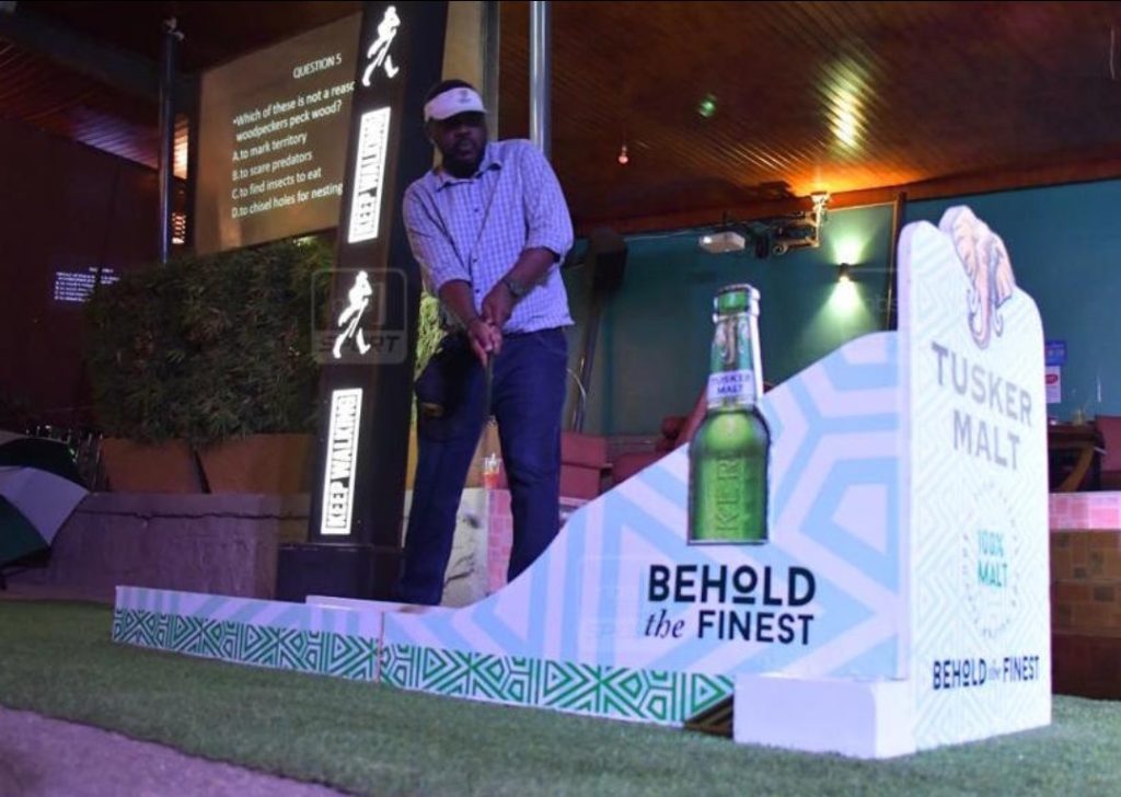 Tusker Malt takes to bars to initiate non-golfers into the game
