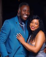  Juliet Zawedde truly looks happy in the hands of Jonah Otim