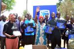  Stanbic Bank Lights up Okere City School Girls with 220 Solar powered Bags