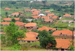 What role do professional Enablers play in tax fraud in Uganda